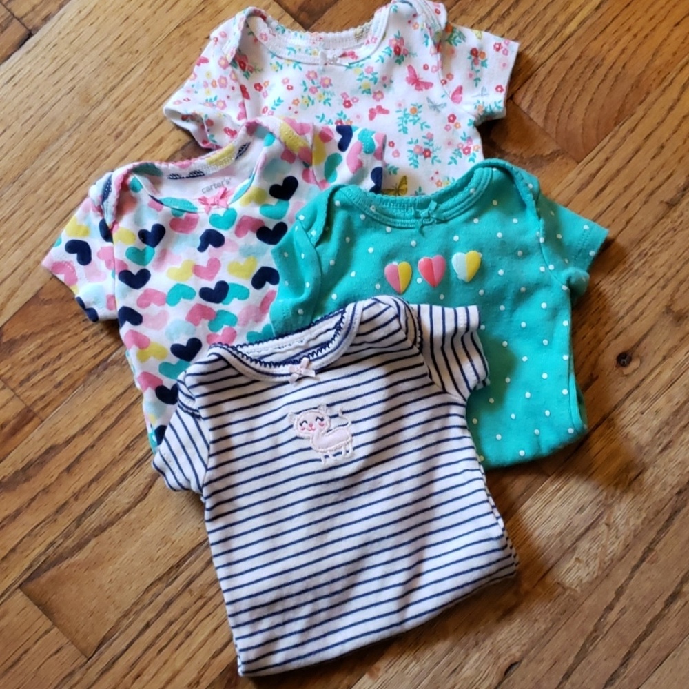 Carter's newborn onesies. Bundle of 4.